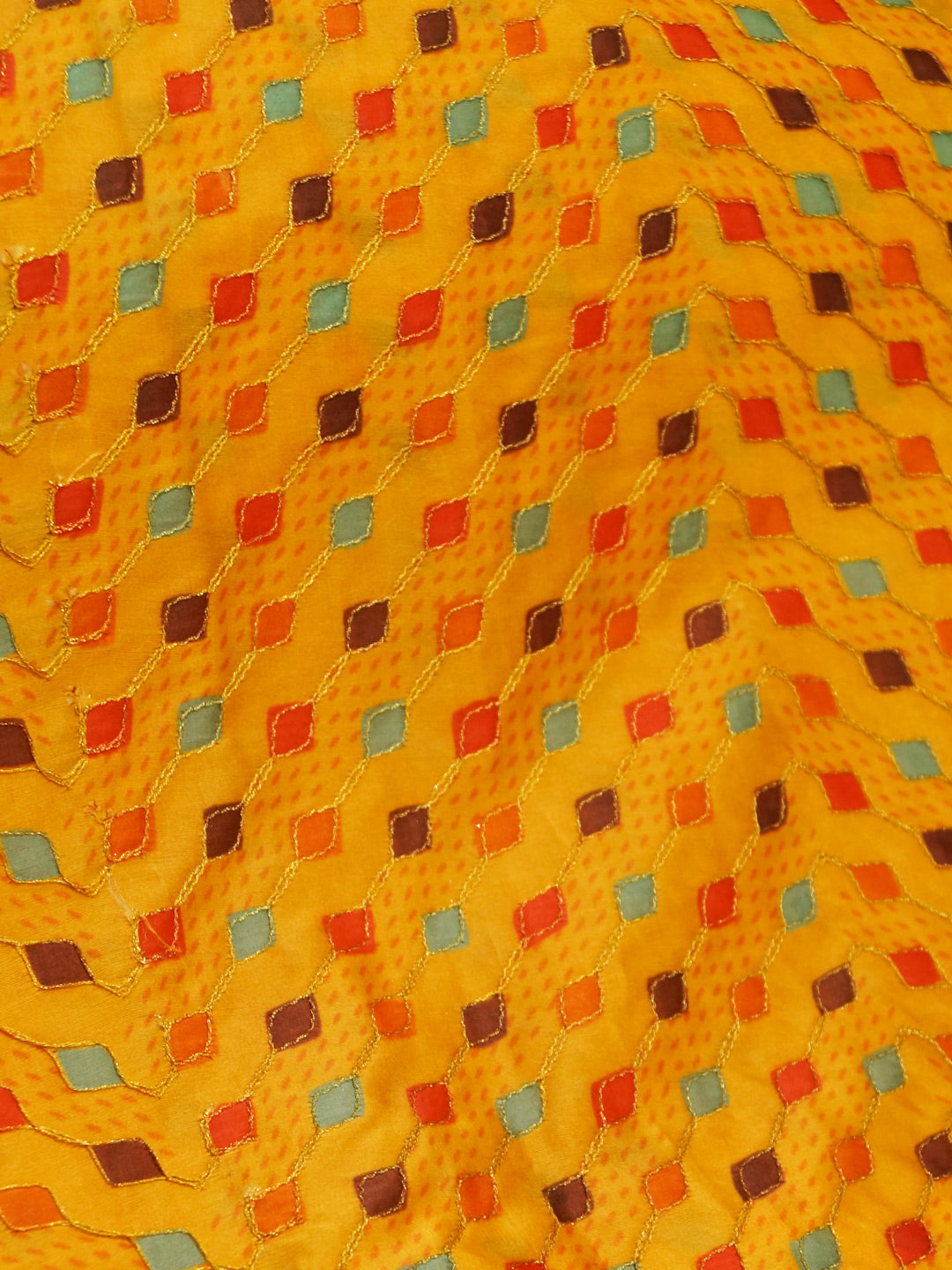 Yellow Coloured Chinon (Nylon) Sequence Embroidered Fabric with position print fabric - MBA Fabricwala