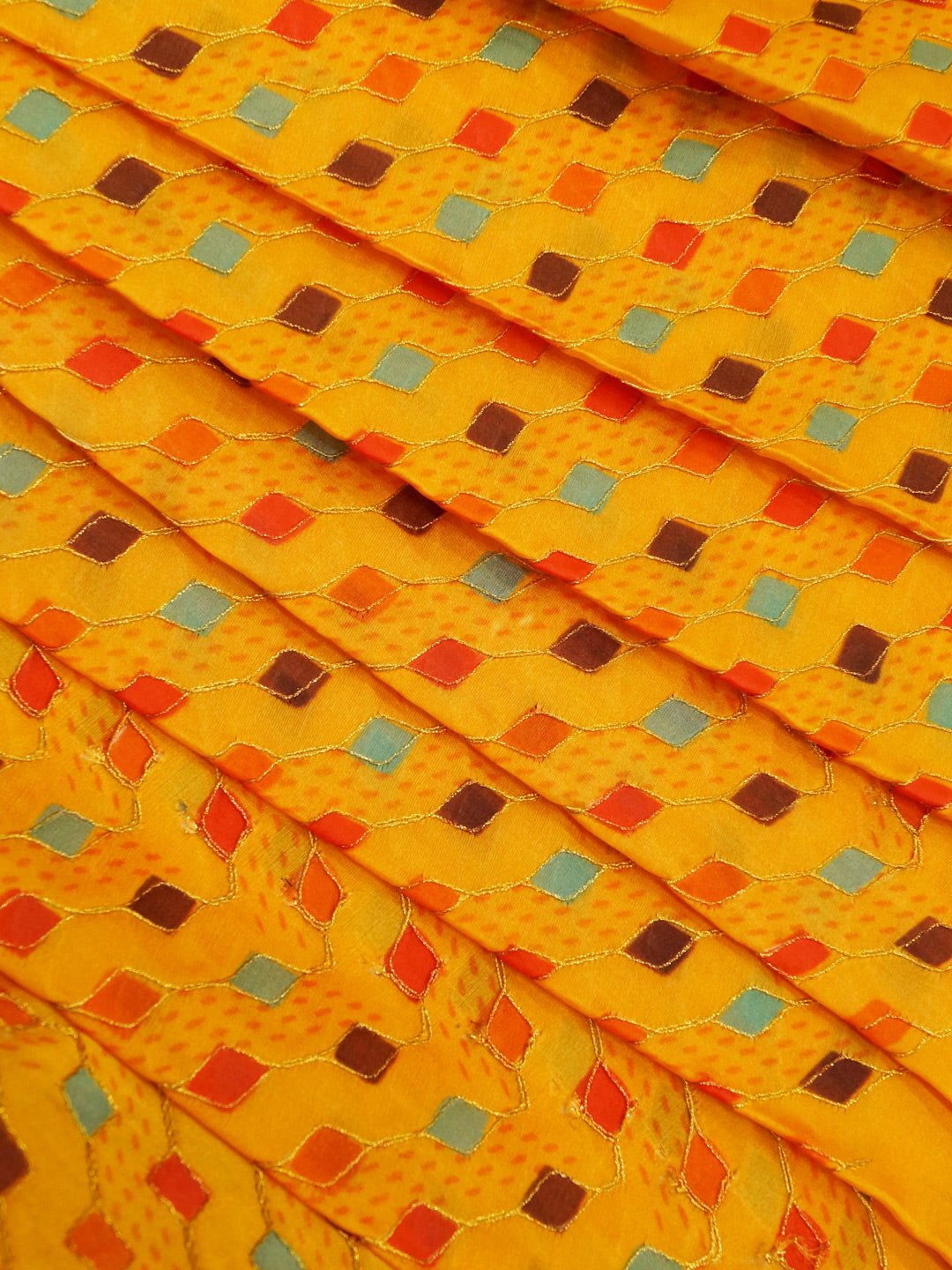 Yellow Coloured Chinon (Nylon) Sequence Embroidered Fabric with position print fabric - MBA Fabricwala