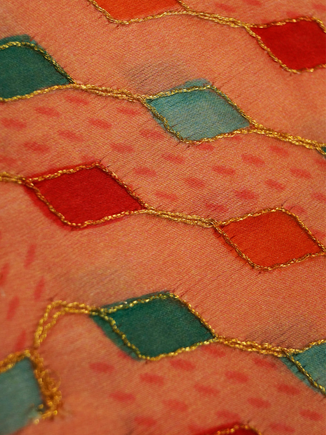 Dark Peach Coloured Chinon (Nylon) Sequence Embroidered Fabric with position print fabric - MBA Fabricwala